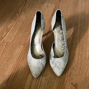Brash snake skin heels